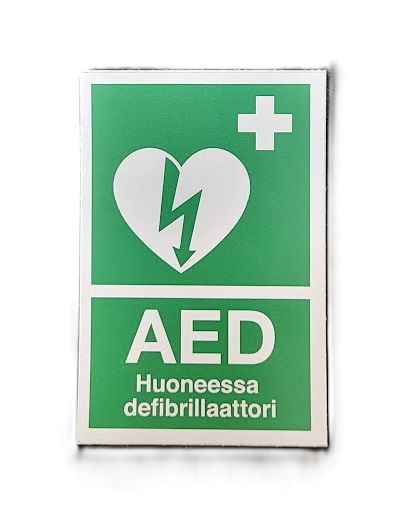AED opastetarra huoneessa defibrillaattori